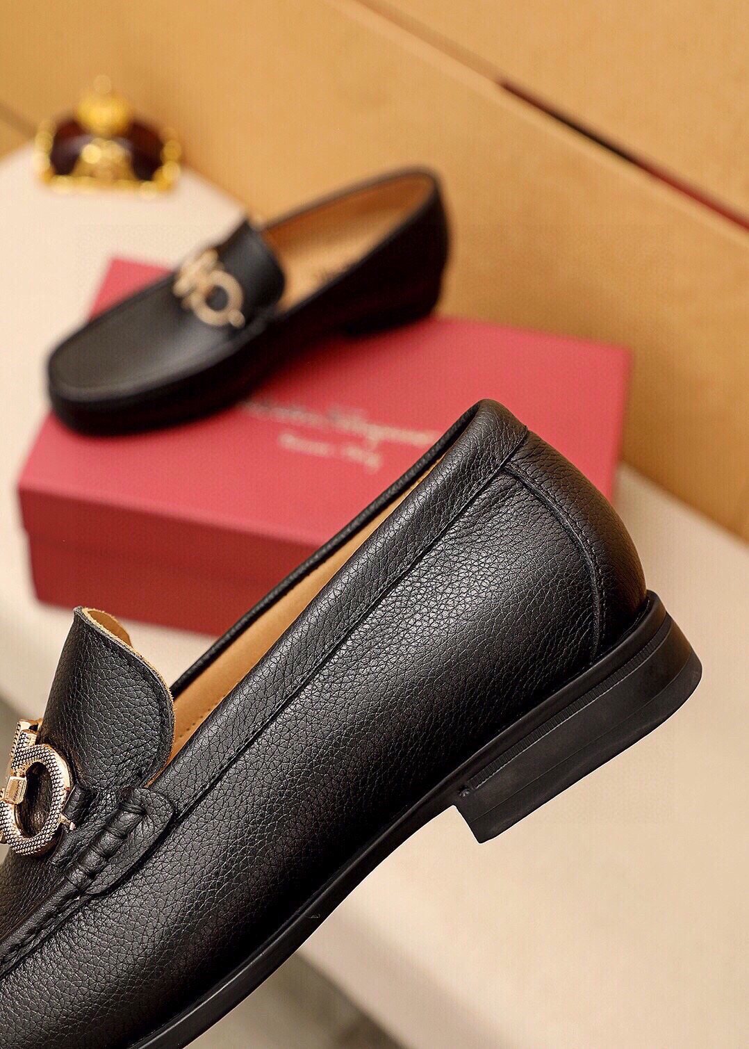 Ferragamo Black Textured Buckle Loafers — detail