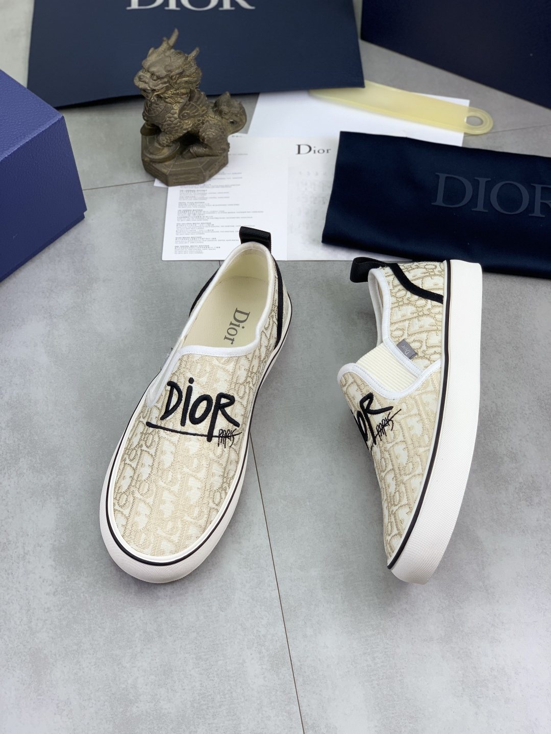 Dior Ivory Canvas Slip-On Sneakers — side